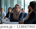 Confident muslim businesswoman listening during a meeting in office 118667460