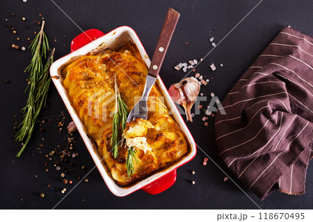 Potato gratin - graten (baked potatoes with cream and cheese) . Potato gratin - graten (baked potatoes with cream and cheese) . 118670495