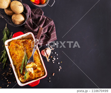 Potato gratin - graten (baked potatoes with cream and cheese) . Potato gratin - graten (baked potatoes with cream and cheese) . 118670499