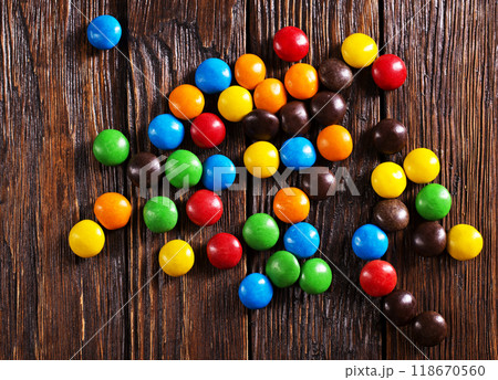 color candy on wooden board color candy on wooden board 118670560
