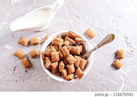 sweet crunchy chocolate children's breakfast on a gray background. sweet crunchy chocolate children's breakfast on a gray background. 118670982