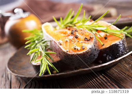 Pieces of red fish fillet. Salmon fillet with rosemary 118671319