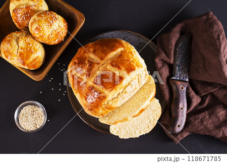 fresh bread on black table fresh bread on black table 118671785