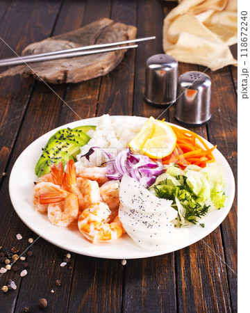 Shrimp poke bowl with avocado, cucumbers and rice, diet food 118672240