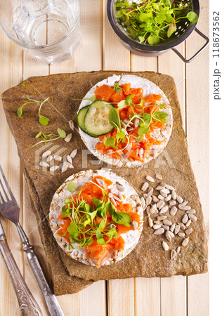 Healthy breakfast, snack, tapas - sandwiches with cream cheese and smoked salmon Healthy breakfast, snack, tapas - sandwiches with cream cheese and smoked salmon 118673562