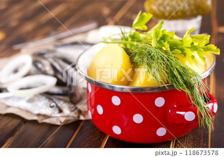 Hamsi little fish with onion and boiled potato Hamsi little fish with onion and boiled potato 118673578