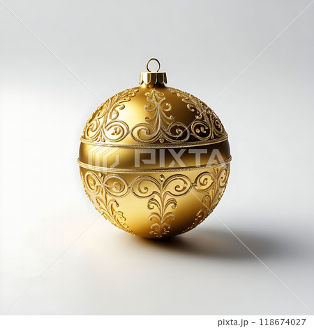 Gold Christmas ornament with intricate scrollwork design isolated on white background. Elegant holiday decoration for festive celebrations 118674027