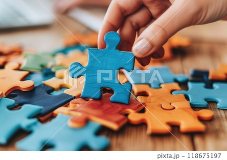 Ai generated Child hand holding colorful heart on blue background. World autism awareness day  118675197