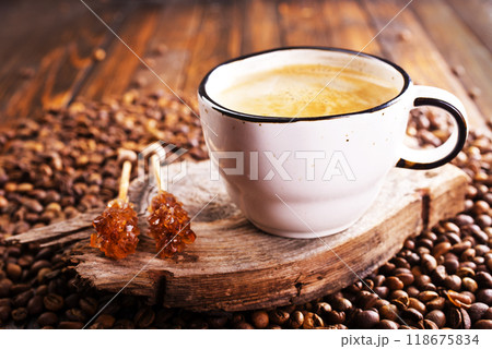 Cup of coffee on wooden background. Cup of coffee on wooden background. 118675834