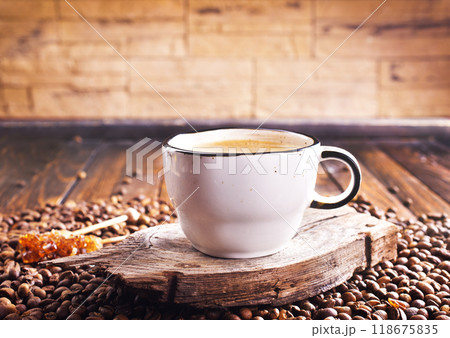 Cup of coffee on wooden background. Cup of coffee on wooden background. 118675835