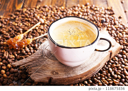 Cup of coffee on wooden background. Cup of coffee on wooden background. 118675836