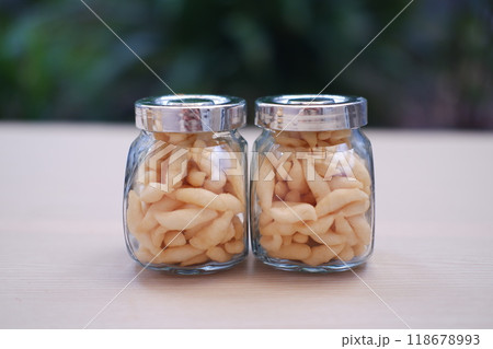 telur gabus sticks in a jar on wooden table telur gabus sticks in a jar on wooden table 118678993