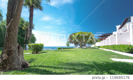 Lawn near the beach and the Atlantic coast of Sesimbra, Portugal timelapse 118680176
