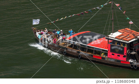 Passengers in a cruise on the Douro river in Tourist boat in Porto, Portugal timelapse Passengers in a cruise on the Douro river in Tourist boat in Porto, Portugal timelapse 118680348