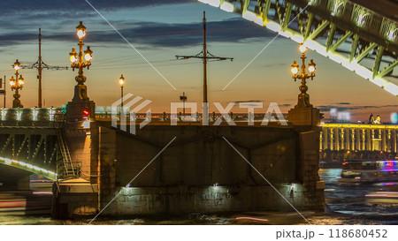 Opening Trinity bridge timelapse and pleasure boats are on Neva river in Saint-Petersburg, Russia. 118680452