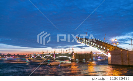 Opening Trinity bridge timelapse and pleasure boats are on Neva river in Saint-Petersburg, Russia. 118680455