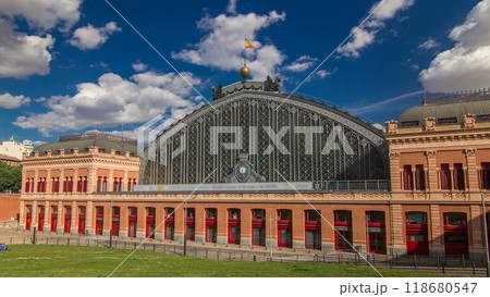 Puerta De Atocha train station building timelapse hyperlapse in Madrid, Spain. Puerta De Atocha train station building timelapse hyperlapse in Madrid, Spain. 118680547