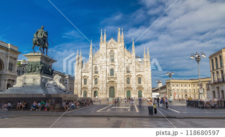 The famous Milan Cathedral timelapse hyperlapse and monument to Victor Emmanuel II on the Piazza del Duomo in Milan, Italy. 118680597