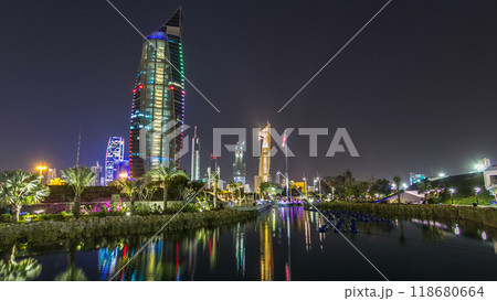 Music fountains in park with Kuwait City cityscape night timelapse hyperlapse 118680664