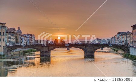 Cityscape view on Arno river with famous Holy Trinity bridge timelapse on the sunset in Florence Cityscape view on Arno river with famous Holy Trinity bridge timelapse on the sunset in Florence 118680899