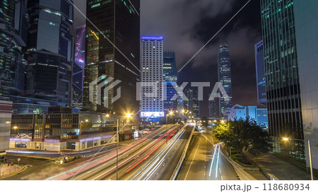 Hong Kong Business District with busy traffic timelapse at night. 118680934