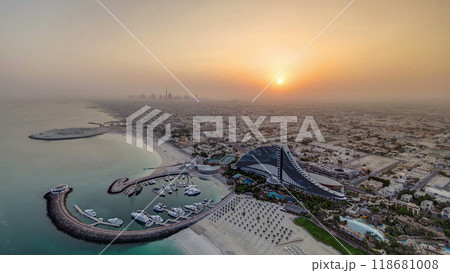 Sunrise. Aerial View of kite beach from helipad, Dubai, UAE timelapse 118681008