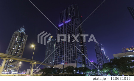 Skyscrapers at the Sheikh Zayed Road night in Dubai timelapse hyperlapse 118681013