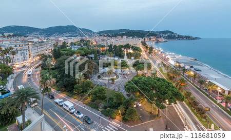 Evening aerial panorama of Nice day to night timelapse, France. Lighted Old Town little streets and waterfront after sunset 118681059