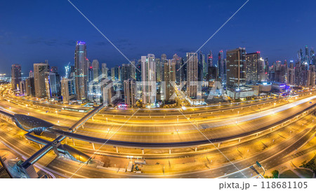 Dubai Marina skyscrapers aerial top view before sunrise from JLT in Dubai night to day timelapse, UAE. Dubai Marina skyscrapers aerial top view before sunrise from JLT in Dubai night to day timelapse, UAE. 118681105