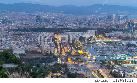 Aerial view over square Portal de la pau day to night timelapse in Barcelona, Catalonia, Spain. 118681212