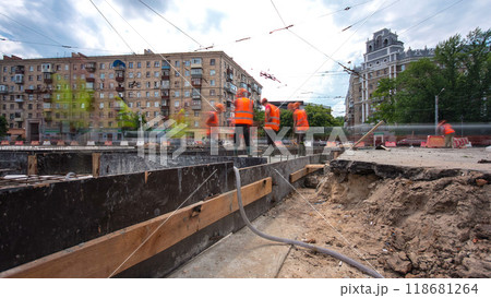 Road construction site with tram tracks repair and maintenance timelapse hyperlapse. Road construction site with tram tracks repair and maintenance timelapse hyperlapse. 118681264