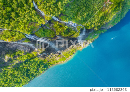 Geiranger Fjord, Norway. Nature in fjords. Traveling by boat on a Norwegian fjord. 118682268