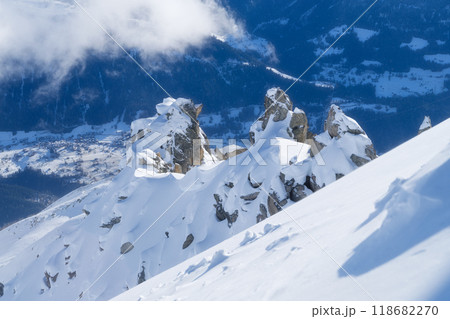 High rocks and snow. Winter mountain landscape. Wallpaper or background. 118682270