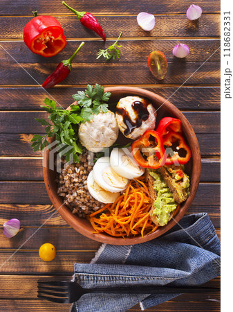 backwheat and milk in glass on a table backwheat and milk in glass on a table 118682331