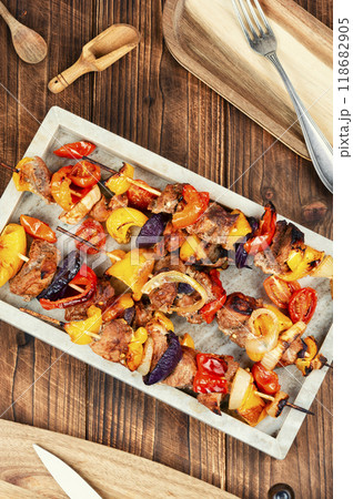 Pork and vegetable kebabs. 118682905