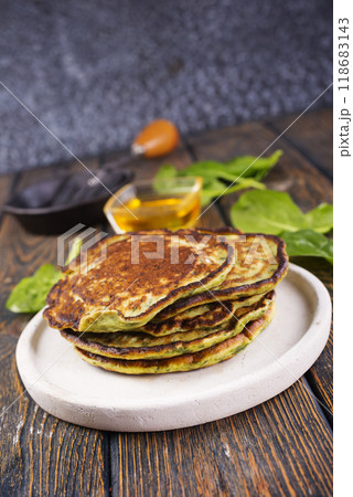 Spinach pancakes with fresh herbs 118683143
