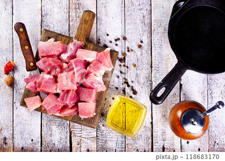 raw meat with spice and salt on wooden board 118683170