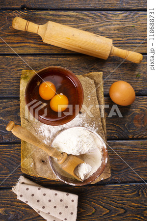 Baking background. Ingredients, kitchen utensils for baking cakes and cookies. 118688731