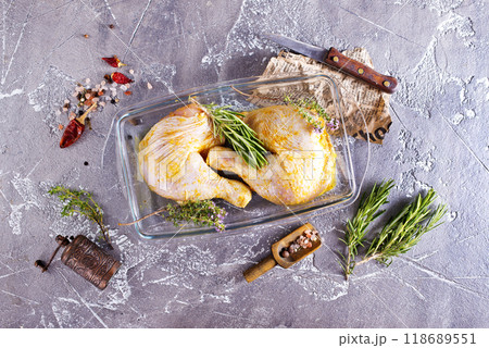 Raw chicken leg quarters 118689551