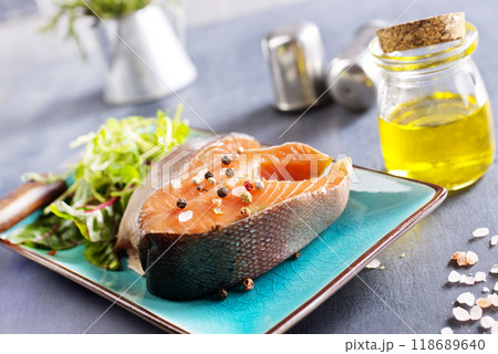 Fresh raw salmon steak with spices. Healthy seafood food Fresh raw salmon steak with spices. Healthy seafood food 118689640