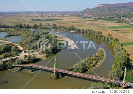 Aerial view of gravel pit mining reservoir and river, ballast, ecological impact on environment Aerial view of gravel pit mining reservoir and river, ballast, ecological impact on environment 118692291