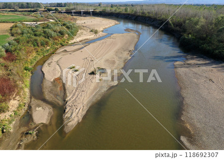 Aerial view of a huge sand riverbank island on a river Aerial view of a huge sand riverbank island on a river 118692307