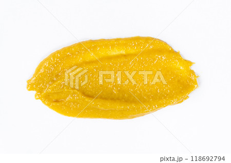 Smear of mustard sauce on white background isolate, creativity in cooking, macro texture Smear of mustard sauce on white background isolate, creativity in cooking, macro texture 118692794