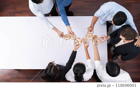 Business team joining cogwheel in circular together. Prudent 118696001