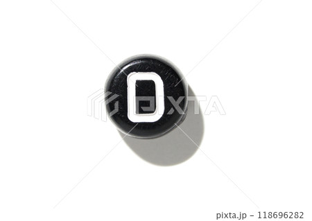 Close-up of vintage typewriter key with shadow on white background 118696282