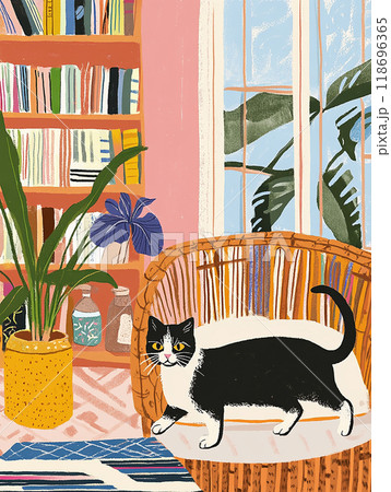 A cat is walking across a rug in a room with a vase of purple flowers on a table. The room is filled with books and a chair 118696365