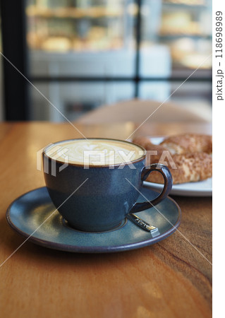 Stylish Coffee and Pastry Setup in Modern Caf 118698989