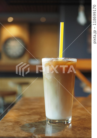 iced late in a transparent glass on cafe table iced late in a transparent glass on cafe table 118699170