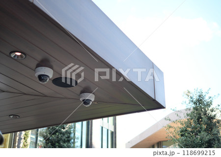 Surveillance cameras are installed under the roof overhang for enhanced safety and security 118699215