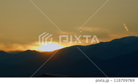 Panorama Mountains Landscape With Sun Shining Through Mountain Peaks. Timelapse. Panorama Mountains Landscape With Sun Shining Through Mountain Peaks. Timelapse. 118709769